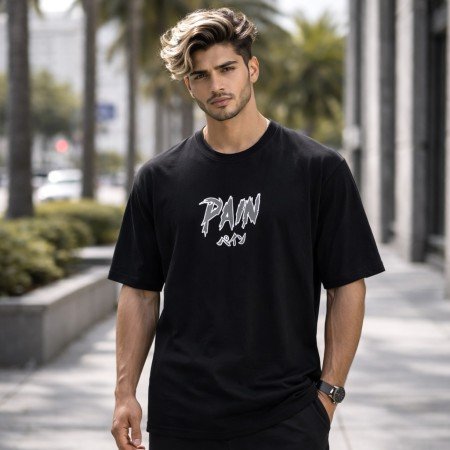 Male model wearing a black Naruto oversized t-shirt featuring a Pain graphic on the front and a relaxed streetwear fit