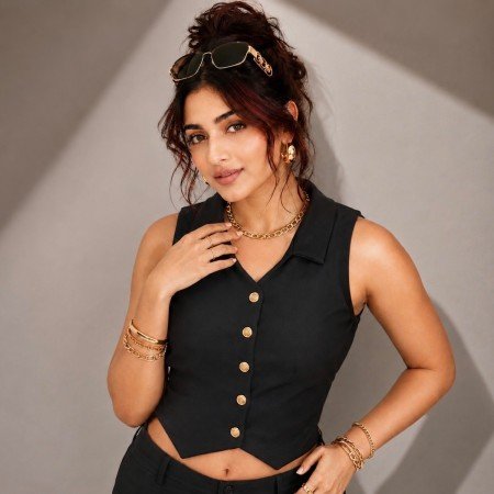 Black tailored vest top for women featuring gold-tone buttons and a structured sleeveless design