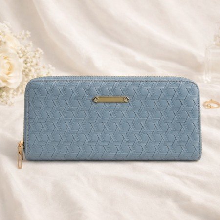 Dusty blue textured zip around wallet for women with metal logo plate detail