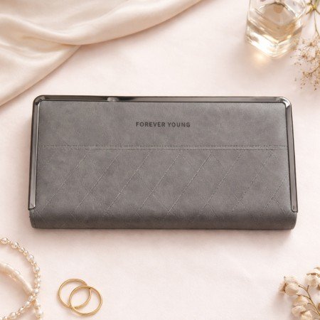 Grey structured frame long wallet for women with quilted texture and metal edge detailing
