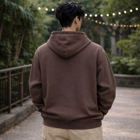 Men brown oversized hoodie with front graphic print, kangaroo pocket, and comfortable cotton fabric for casual everyday wear.