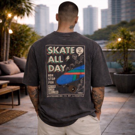 Men washed charcoal oversized crew neck graphic t-shirt with skate print on front, front view