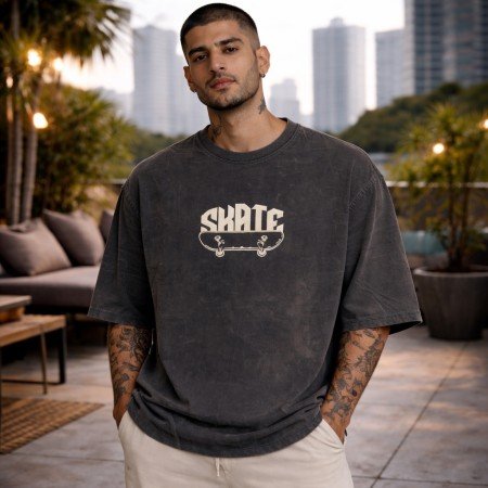 Men washed charcoal oversized crew neck graphic t-shirt with skate print on front, front view