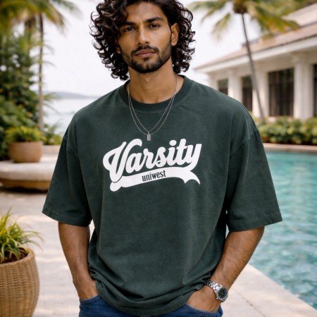 Men washed dark green oversized crew neck graphic t-shirt with varsity text print, front view