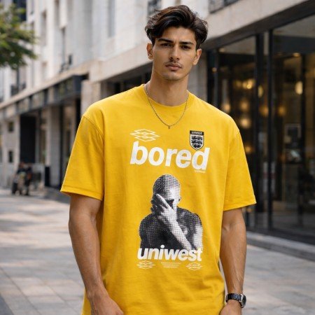 Men yellow oversized crew neck graphic t-shirt with printed front design, front view