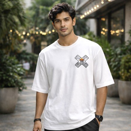 Male model wearing a white One Piece oversized t-shirt with Straw Hat pirate emblem on the chest
