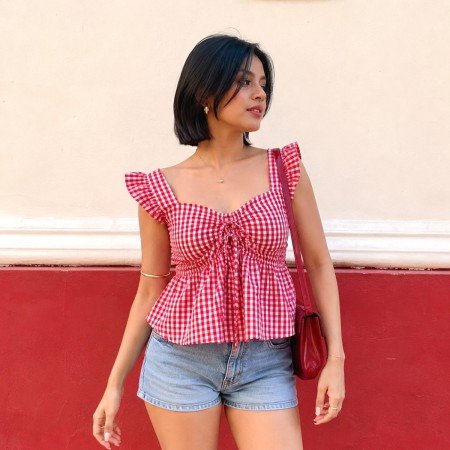 Women's red gingham tie-front peplum top with flutter sleeves and gathered bust detail