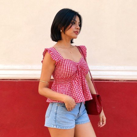 Women's red gingham tie-front peplum top with flutter sleeves and gathered bust detail