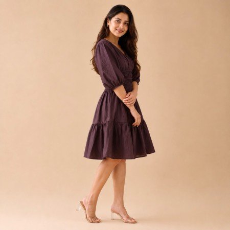 Women's chocolate brown midi dress featuring a smocked waist, V-neckline and puff sleeves