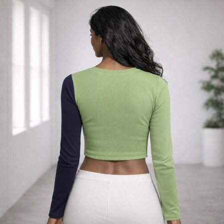 Women’s color block asymmetric full sleeve ribbed crop top in green and navy blue, front view, free size fit