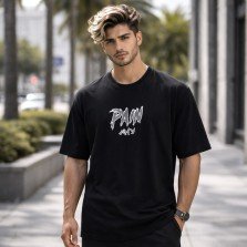 Male model wearing a black Naruto oversized t-shirt featuring a Pain graphic on the front and a relaxed streetwear fit