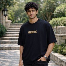 Men black oversized crew neck graphic t-shirt with text print on chest, front view