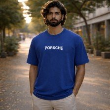 Men's blue oversized 100% cotton crew neck graphic T-shirt with short sleeves and relaxed streetwear style front view.