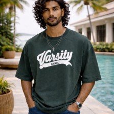 Men washed dark green oversized crew neck graphic t-shirt with varsity text print, front view