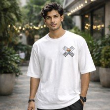 Male model wearing a white One Piece oversized t-shirt with Straw Hat pirate emblem on the chest