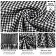 Close-up of black gingham 100% cotton fabric showing the soft, breathable weave, elastic smocked back and peplum hem detail.