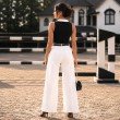Back view of women's black ribbed sleeveless polo knit top with contrast collar