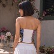 Back view of women's floral tube top with stretchable smocked back panel for a comfortable fit.