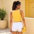 Back view of a butter yellow cotton ribbed tank top for women
