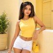 Butter yellow cotton ribbed tank top for women with a fitted sleeveless design
