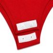 Double snap button closure detail on a cherry red women's bodysuit