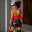 Backless cherry red halter neck bodysuit with an elegant open-back design
