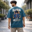 Male model showcasing the back of a teal blue Dragon Ball t-shirt with a large Goku graphic print and oversized silhouette