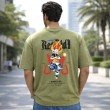 Male model showcasing the back of an olive green Dragon Ball Z t-shirt with Vegeta anime artwork