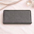 Back side of grey structured long wallet for women with stitched panel design