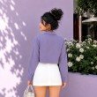Back view of lilac long sleeve cropped shirt with clean minimalist design