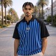 Front view of men blue striped cotton jersey polo T-shirt with contrast sleeves and comfortable everyday fit.