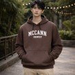 Men brown oversized hoodie with front graphic print, kangaroo pocket, and comfortable cotton fabric for casual everyday wear.