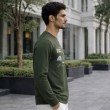 Men dark green graphic crew neck full sleeve t-shirt side view