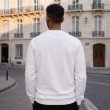 Back view of men white printed full sleeve crew neck T-shirt showing relaxed cotton fit for casual everyday wear.