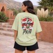 Female model wearing unisex sage green oversized Naruto Pain anime graphic cotton T-shirt back view.