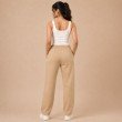 Back view of women's beige casual jogger pants with elasticated waist