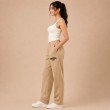 Side view of beige relaxed fit jogger pants for women
