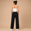 Back view of women's black wide leg trousers with comfortable elasticated waist
