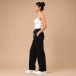Side view of black wide leg trousers for women with relaxed fit design