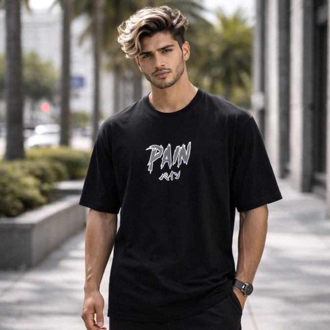 Male model wearing a black Naruto oversized t-shirt featuring a Pain graphic on the front and a relaxed streetwear fit